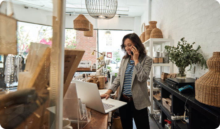 person-on-phone-in-conersvatory